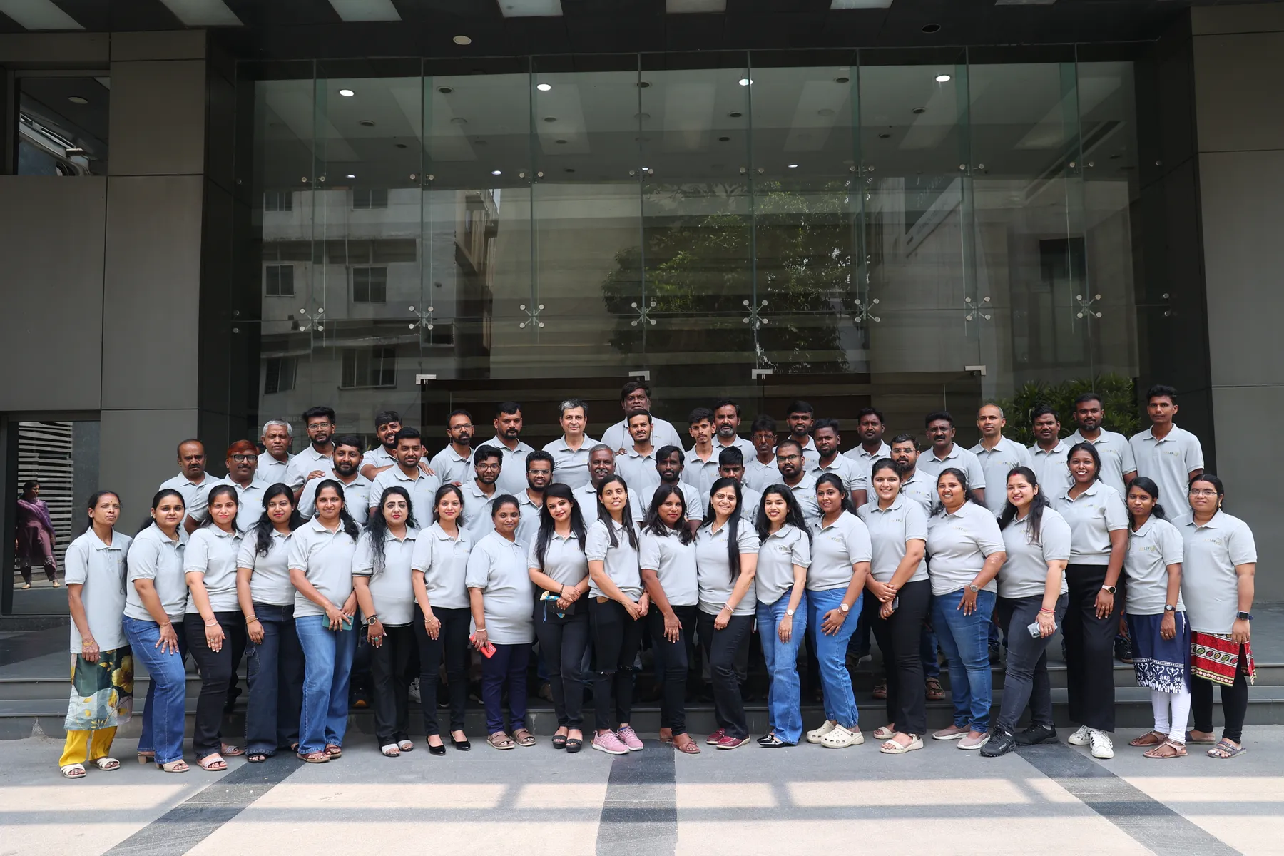 The L&W team outside the Bengaluru head office, 20th anniversary 2026